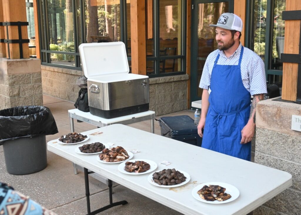 Time to eat! Austin Yohey of UNR Extension explains the offerings.