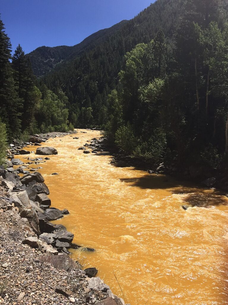 The Animas River runs yellow after the Gold King Mine Spill in 2015.