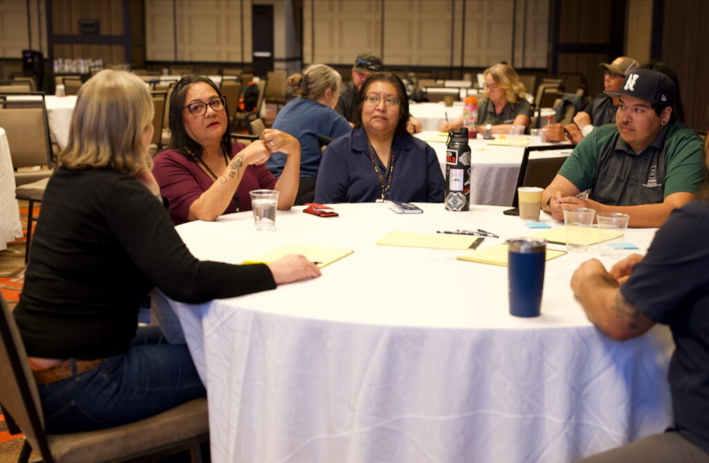 Workshop attendees discuss climate impacts in their regions.