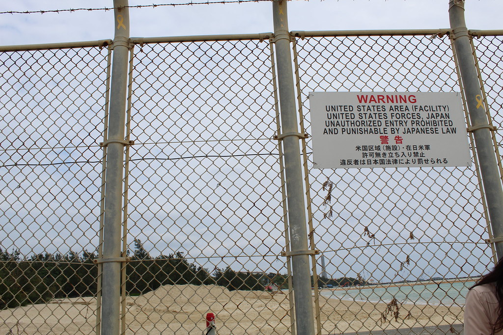 Barbed wire fence at Oura Bay
